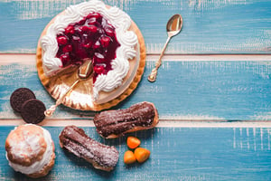 DIfferent desserts on a blue table