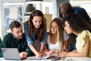 Group of male and female young people studying