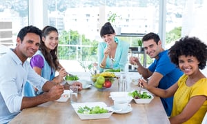 Young business people having lunch together