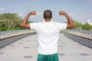 back-view-sporty-black-guy-posing-flexing-both-biceps
