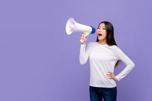 beautiful-asian-woman-talking-magaphone