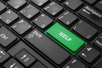 close-up-green-button-with-word-help-black-keyboard-creative-background-copy-space-concept-quick-help-magic-button-mutual-assistance
