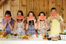 friends-posing-with-watermelon-slices