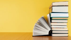 front-view-pile-books-with-copy-space