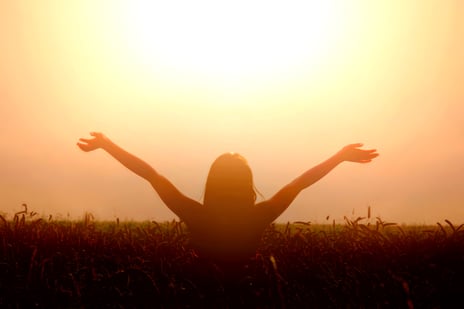 girl-lift-her-hands-sky-feel-freedom