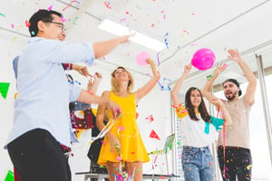 group-enjoy-young-people-celebrating-throwing-confetti-while-cheering-jumping-party-white-room-1