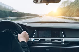 man-driving-car-from-rear-view-1