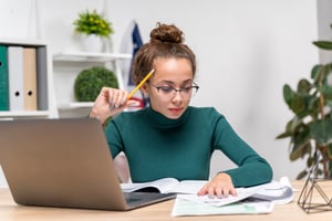 medium-shot-girl-focusing-studying