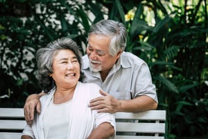 senior-couple-playing-together-park