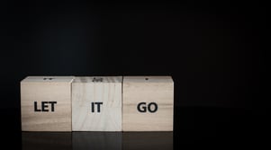 three-wooden-cubes-row-let-it-go