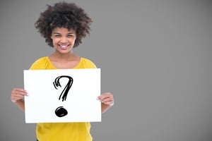 woman-smiles-with-question-mark
