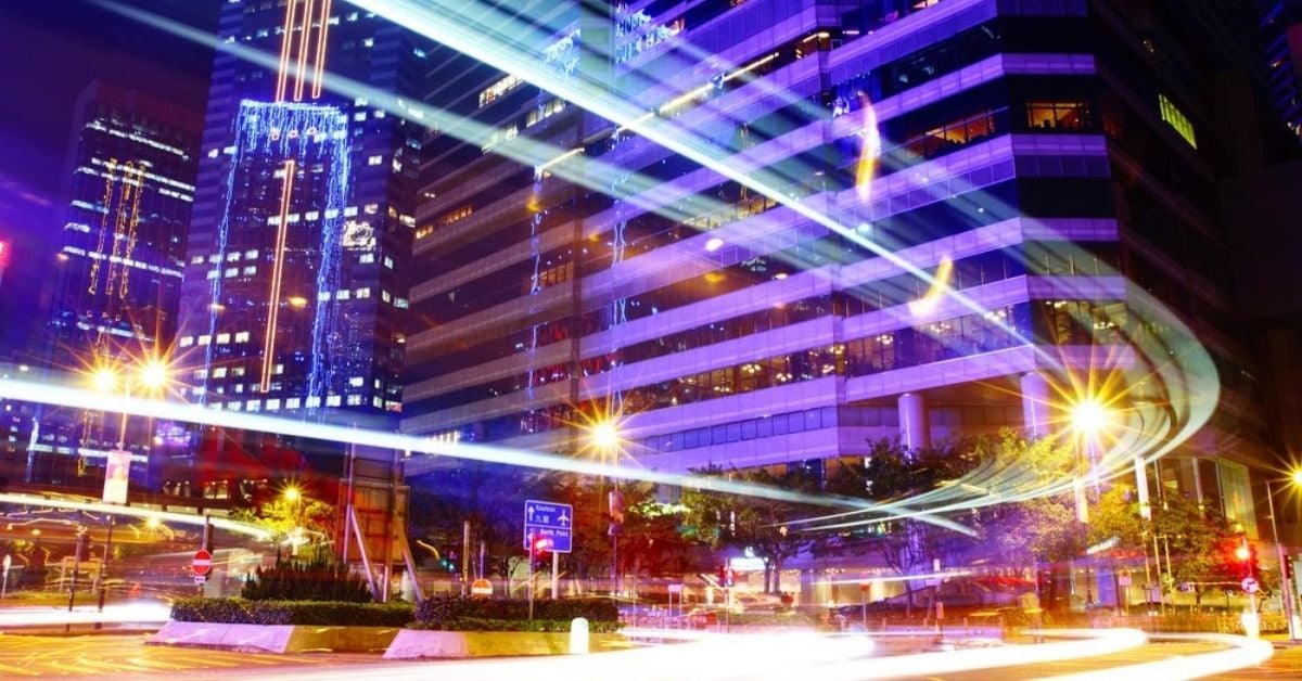 Fast moving car trail in city at night