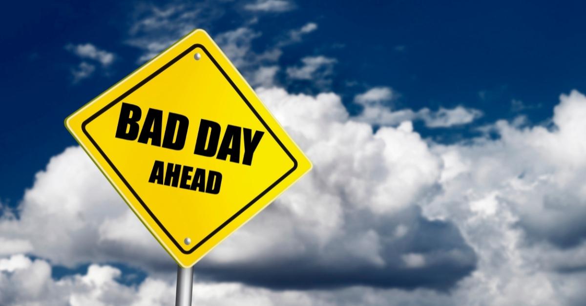 Sign with a pillowy cloudy background that says "Bad Day Ahead"